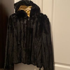 Black faux fur zip up jacket with hoodie. Size small